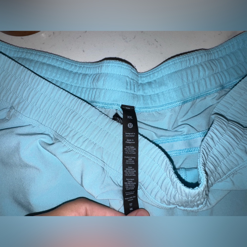 Lululemon Pacebreaker Linerless Shorts 5”. Color: Cyan Blue